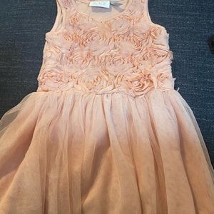 Peach colored children’s place flower dress